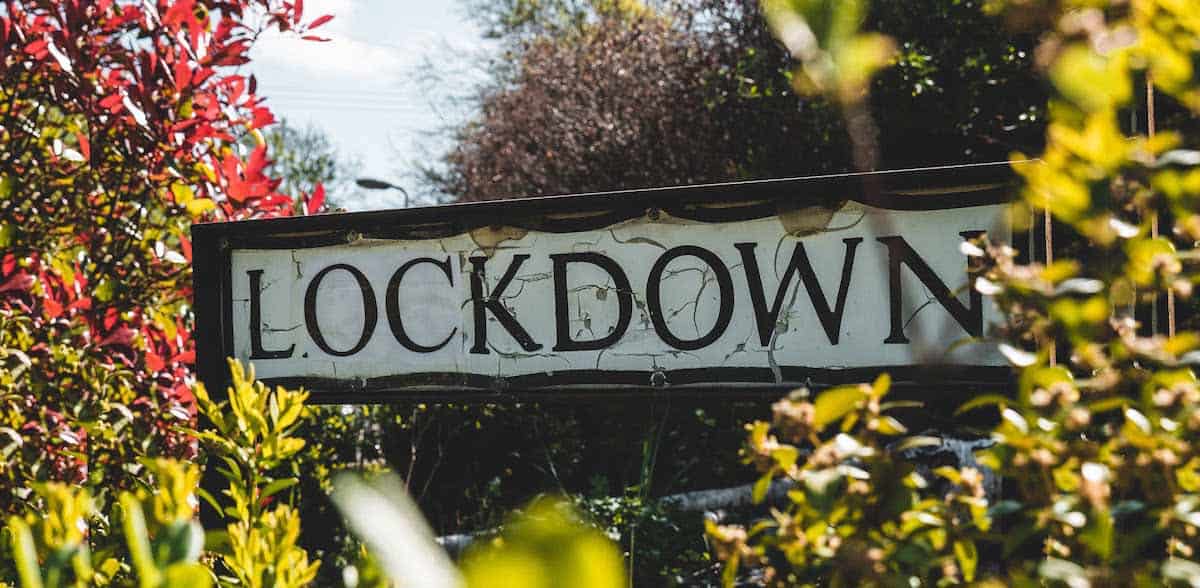 lockdown sign and trees