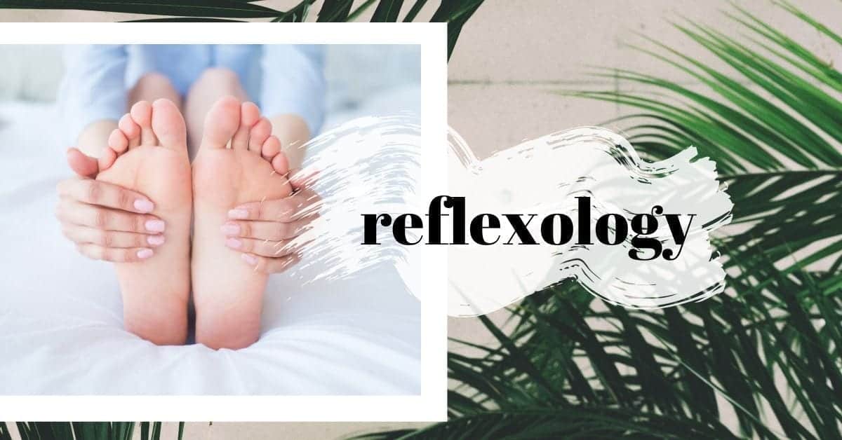reflexology and foot on palm background
