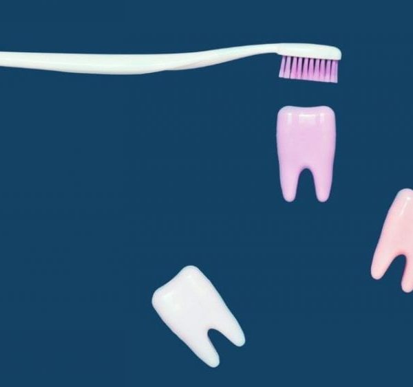 toothbrush and teeth on blue background