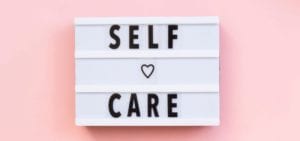 self care on pink background