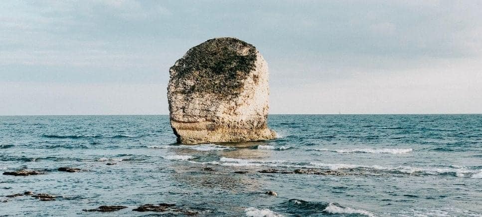 boulder in the sea