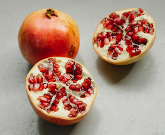 pomegranate on grey background
