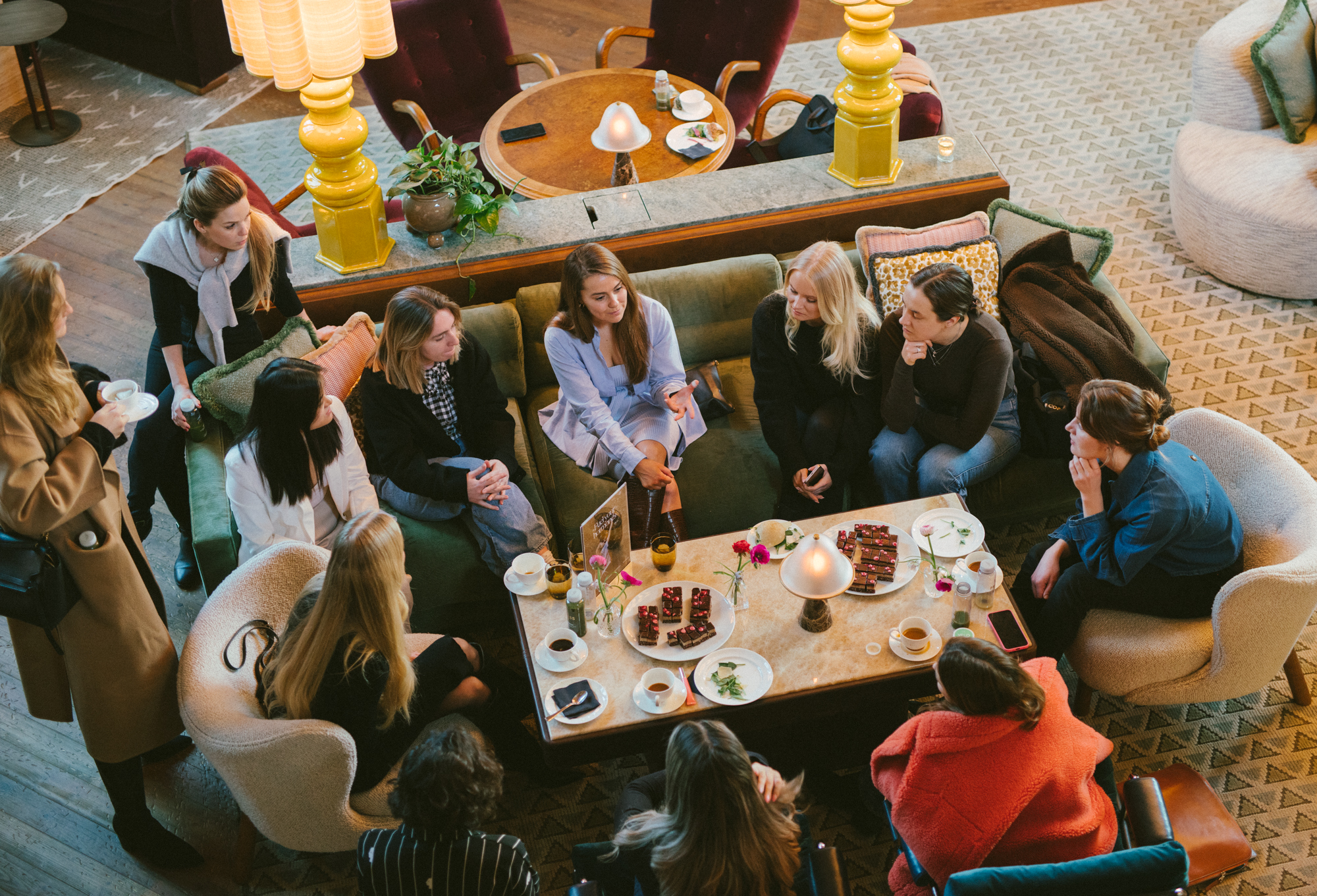 women sat around table at soho house